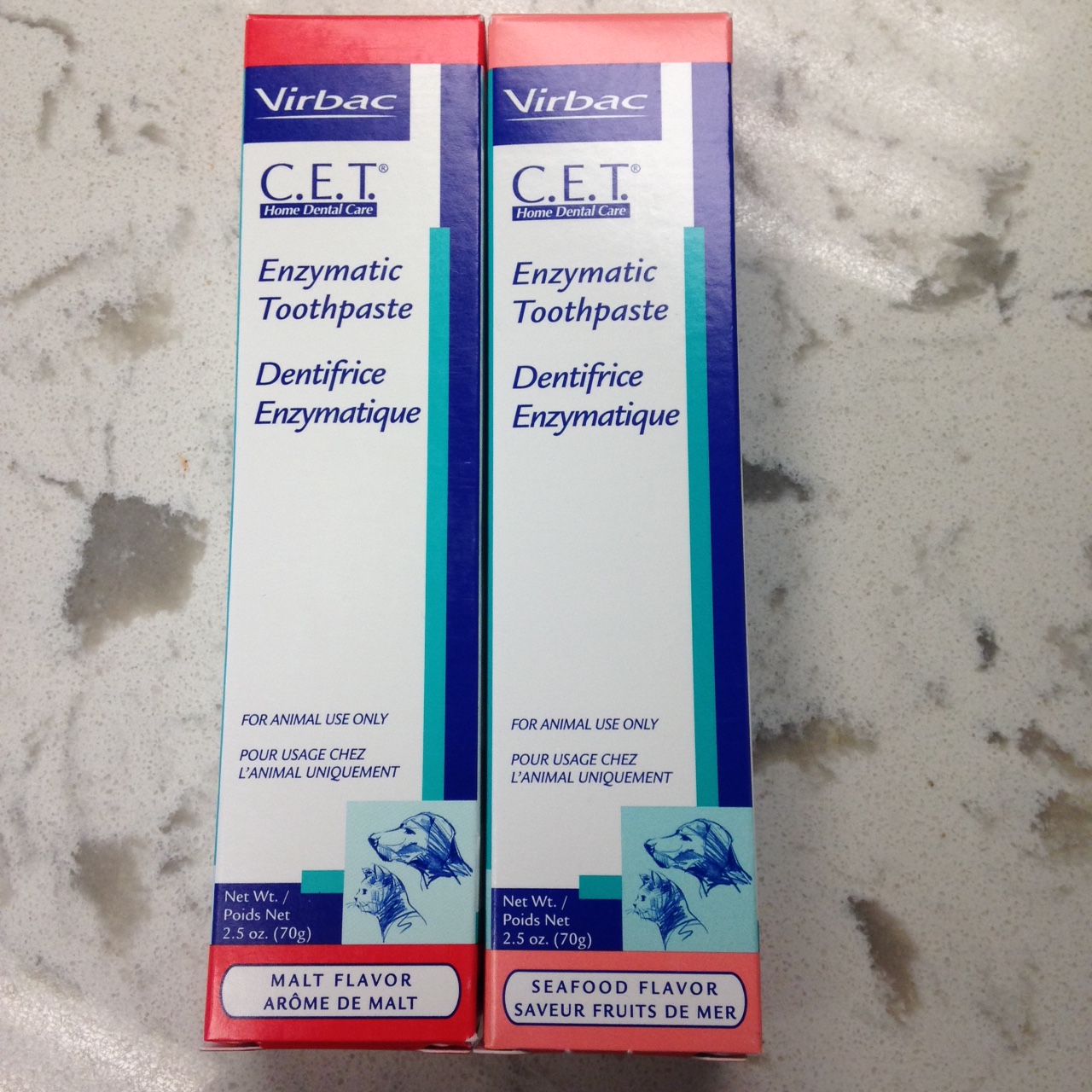 Two boxes of Virbac CET enzymatic toothpaste